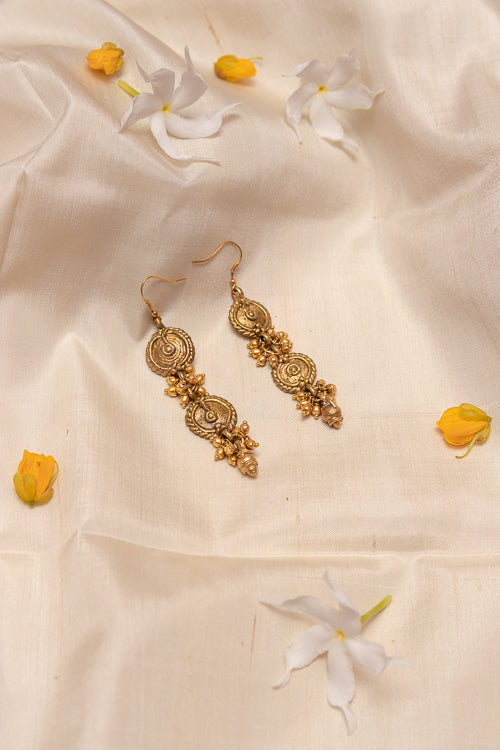 Long circular dokra brass earrings DEr82