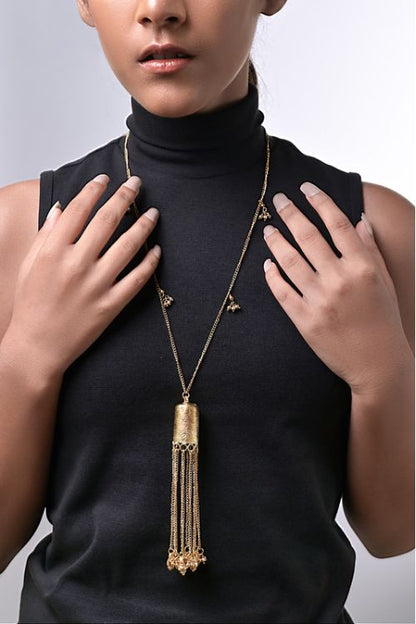 Women wearing brass pendant necklace