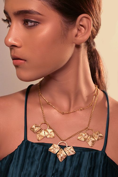 women wearing sustainable dokra jewellery