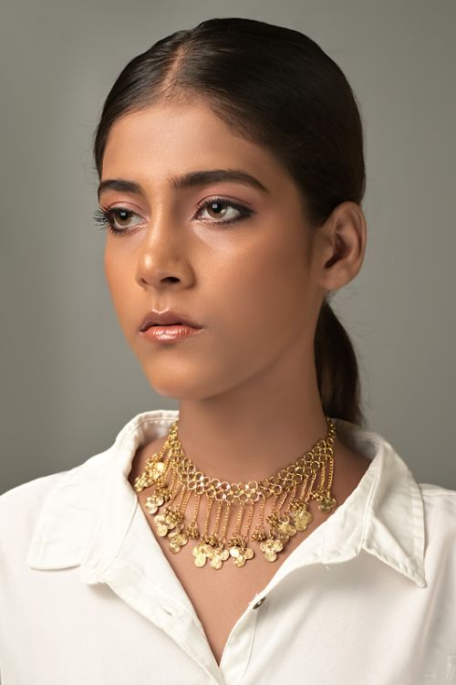 Women wearing beautiful choker brass necklace
