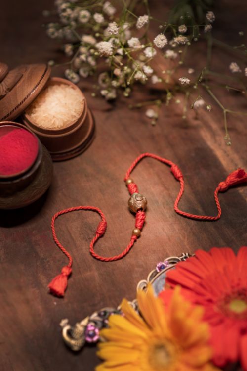 Miharu Handmade Dokra Orange Rakhi
