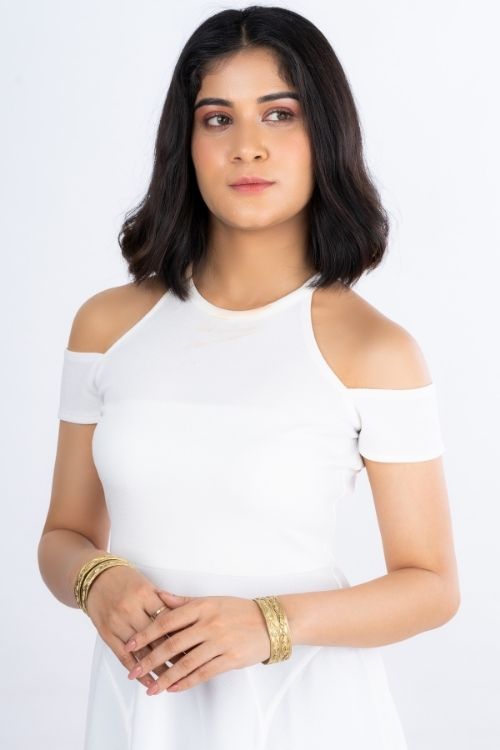 Women wearing dokra bangle