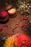 Miharu Handmade Light Red Brass Ring Rakhi