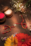 Miharu Handmade Red-Yellow Dokra Beaded Rakhi