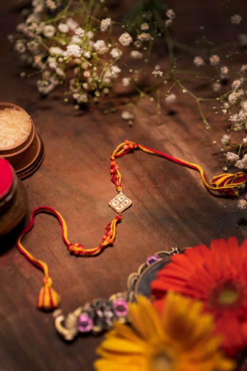Miharu Handmade Multi Thread Orange Beaded Rakhi