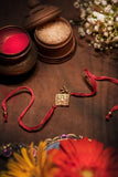 Miharu Handmade Light Red Dokra Square Rakhi